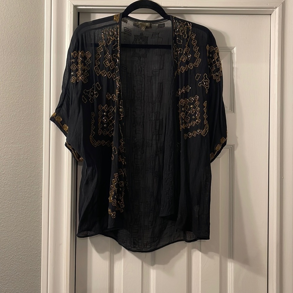 Gold beaded sheer black shawl.